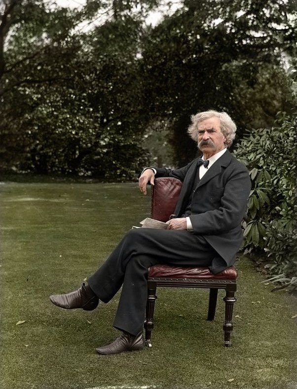 Mark Twain in his garden, 1900.